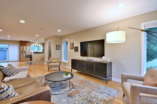 717 S Washington St, Elmhurst, IL 60126 - living room with light wood-type flooring and recessed lighting