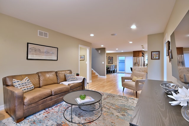 717 S Washington St, Elmhurst, IL 60126 - living room featuring light wood-style floors, stairs, and recessed lighting