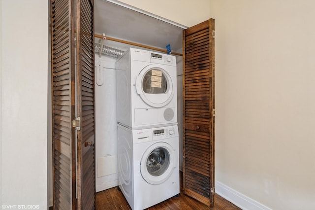 6970 N Wolcott Ave Unit 1, Chicago, IL 60626 - washroom with stacked washer and clothes dryer and dark wood finished floors