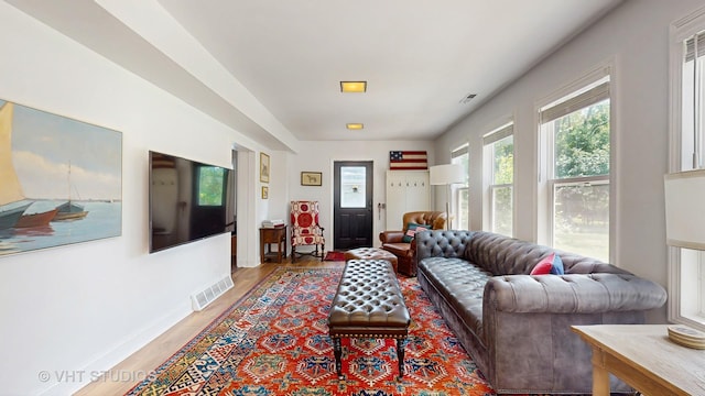 4335 Lee St, Skokie, IL 60076 - living room with light wood finished floors and baseboards