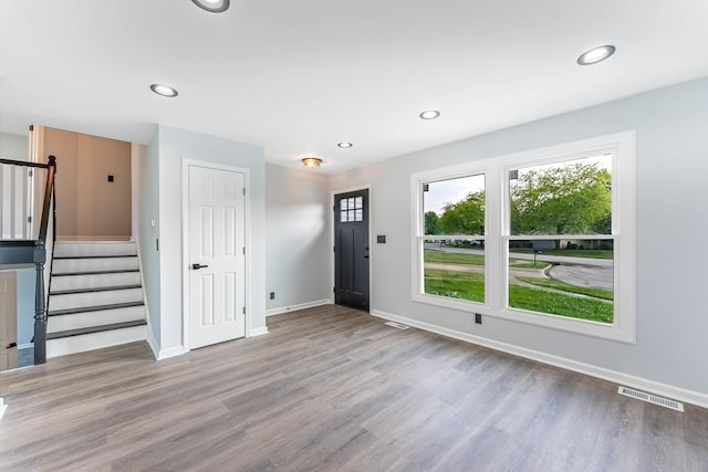 346 Princeton Ave, Bourbonnais, IL 60914 - unfurnished living room featuring stairway, recessed lighting, and wood finished floors