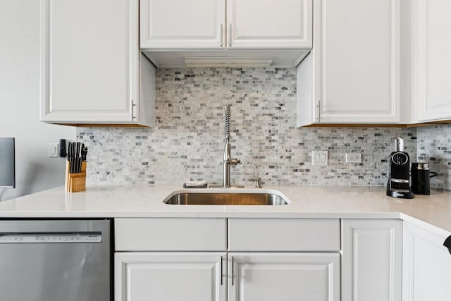 901 W Madison St Unit 1002, Chicago, IL 60607 - kitchen with stainless steel dishwasher, white cabinets, light countertops, and backsplash