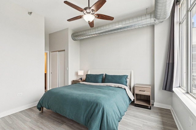 901 W Madison St Unit 1002, Chicago, IL 60607 - bedroom featuring wood finished floors and a ceiling fan