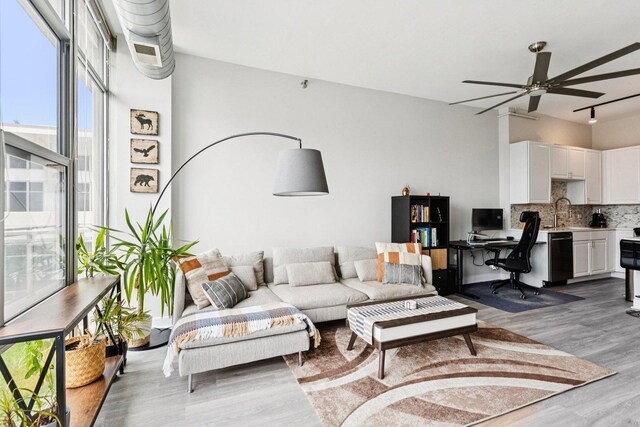 901 W Madison St Unit 1002, Chicago, IL 60607 - living area with light wood-type flooring, ceiling fan, and a desk