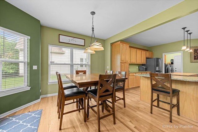 735 Chasewood Dr, South Elgin, IL 60177 - dining area with light wood-type flooring and baseboards