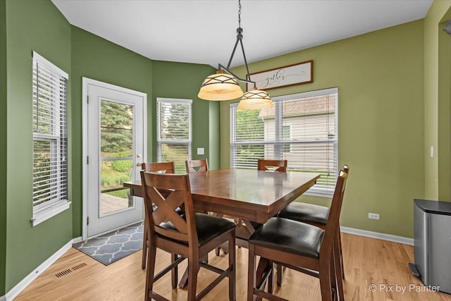 735 Chasewood Dr, South Elgin, IL 60177 - dining space with light wood-style flooring and healthy amount of natural light