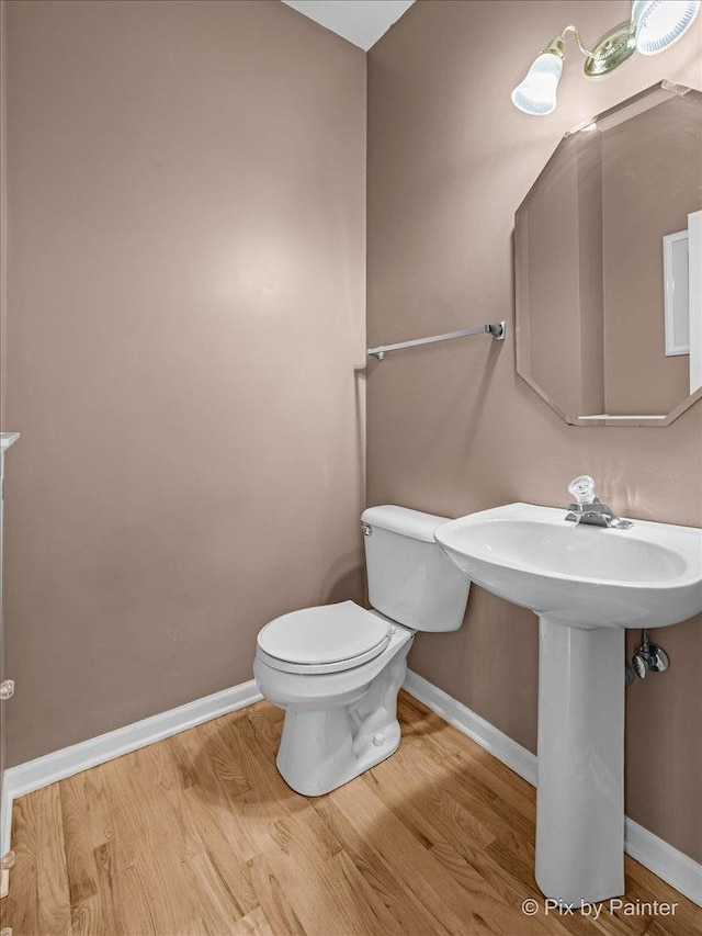 735 Chasewood Dr, South Elgin, IL 60177 - bathroom featuring wood finished floors and baseboards