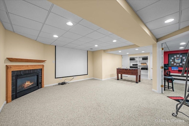 735 Chasewood Dr, South Elgin, IL 60177 - playroom with carpet, a tiled fireplace, a paneled ceiling, and recessed lighting