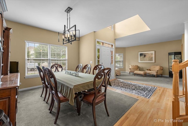 735 Chasewood Dr, South Elgin, IL 60177 - dining space with a chandelier and wood finished floors