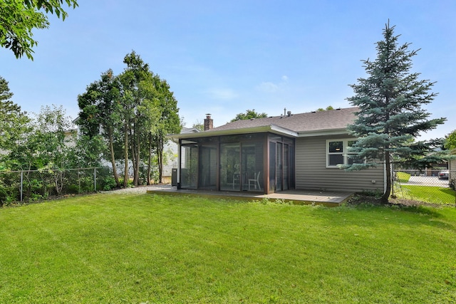 6853 Red Wing Dr, Woodridge, IL 60517 - fenced backyard with a sunroom and a deck