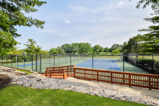 6853 Red Wing Dr, Woodridge, IL 60517 - view of tennis court with view of wooded area