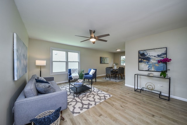 6853 Red Wing Dr, Woodridge, IL 60517 - living room featuring a ceiling fan, plenty of natural light, and wood finished floors