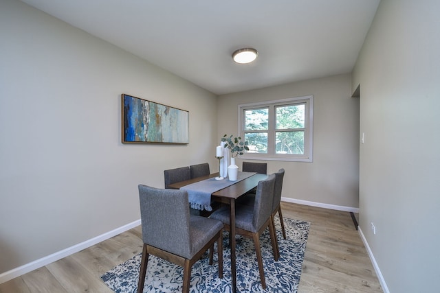 6853 Red Wing Dr, Woodridge, IL 60517 - dining area featuring light wood finished floors and baseboards