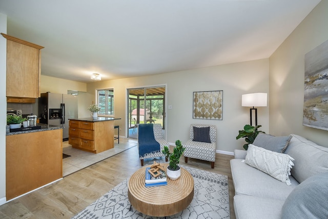 6853 Red Wing Dr, Woodridge, IL 60517 - living area with light wood-style floors and baseboards