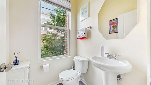 3546 Kemper Dr, Woodridge, IL 60517 - half bath featuring toilet and baseboards