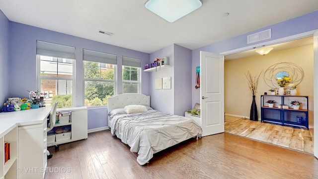 3546 Kemper Dr, Woodridge, IL 60517 - bedroom with wood finished floors and an office area