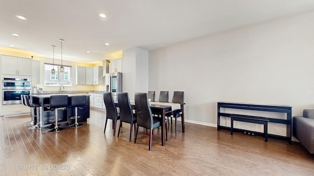 3546 Kemper Dr, Woodridge, IL 60517 - dining room with wood finished floors and recessed lighting