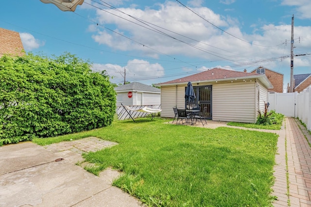 7125 S Richmond St, Chicago, IL 60629 - fenced backyard with a patio area