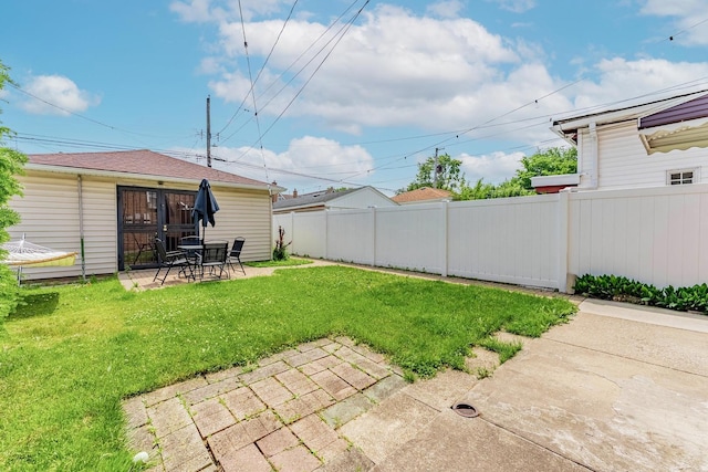 7125 S Richmond St, Chicago, IL 60629 - view of yard with a patio area