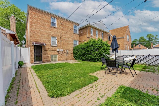 7125 S Richmond St, Chicago, IL 60629 - fenced backyard featuring a patio