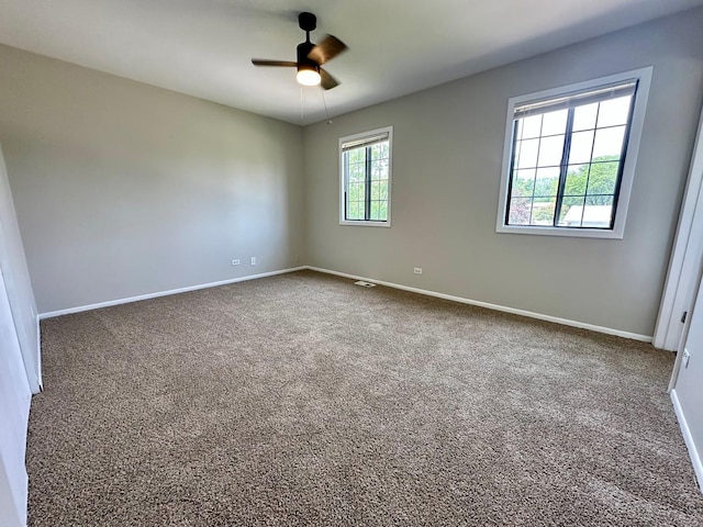2363 Cove Dr, Hanover Park, IL 60133 - spare room with ceiling fan and carpet floors