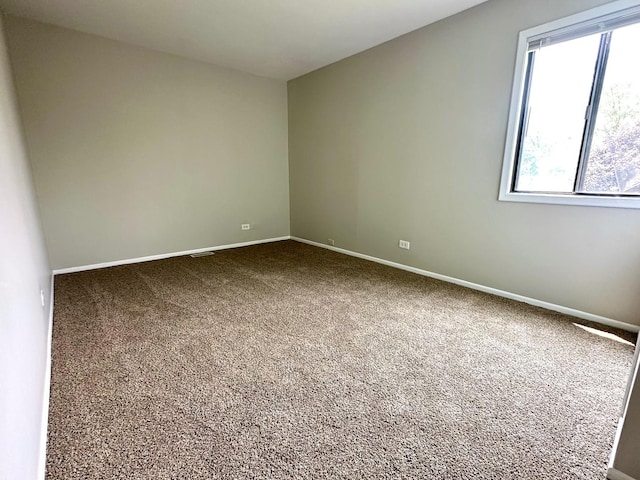 2363 Cove Dr, Hanover Park, IL 60133 - carpeted spare room featuring baseboards