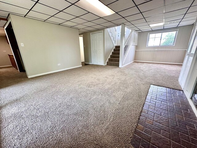 2363 Cove Dr, Hanover Park, IL 60133 - below grade area featuring stairway, a paneled ceiling, and carpet floors