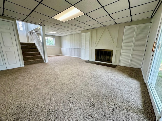 2363 Cove Dr, Hanover Park, IL 60133 - below grade area featuring stairs, a fireplace, a drop ceiling, and carpet floors