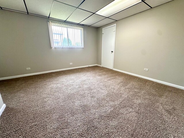 2363 Cove Dr, Hanover Park, IL 60133 - carpeted empty room featuring a paneled ceiling and baseboards
