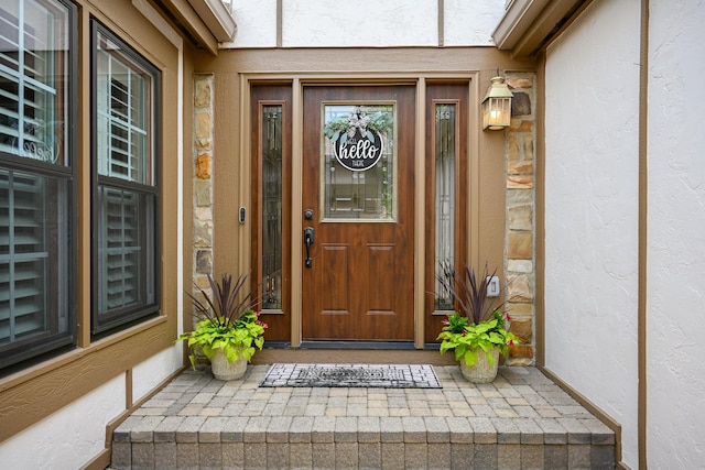 1058 Oakview Dr Unit 1058, Wheaton, IL 60187 - doorway to property with stucco siding