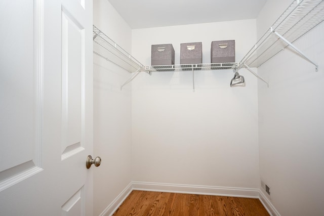 1058 Oakview Dr Unit 1058, Wheaton, IL 60187 - walk in closet featuring light wood finished floors