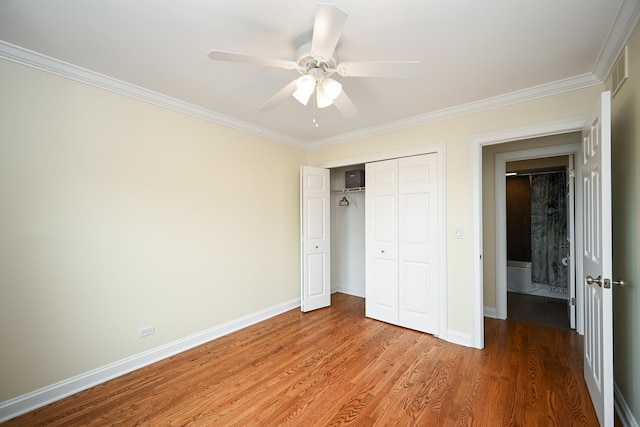 1058 Oakview Dr Unit 1058, Wheaton, IL 60187 - unfurnished bedroom featuring ornamental molding, light wood-style flooring, a closet, and a ceiling fan