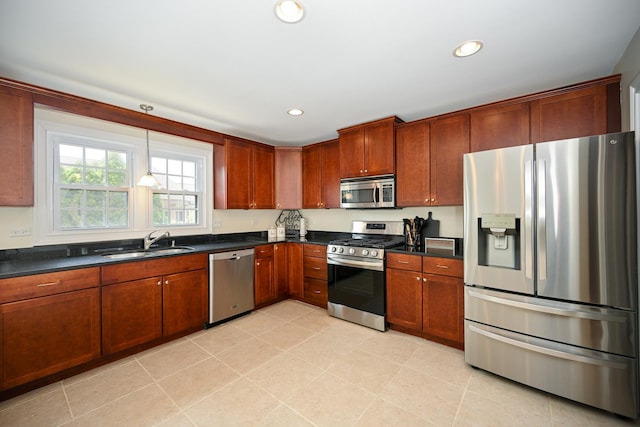 1058 Oakview Dr Unit 1058, Wheaton, IL 60187 - kitchen with stainless steel appliances, dark countertops, recessed lighting, decorative light fixtures, and light tile patterned floors