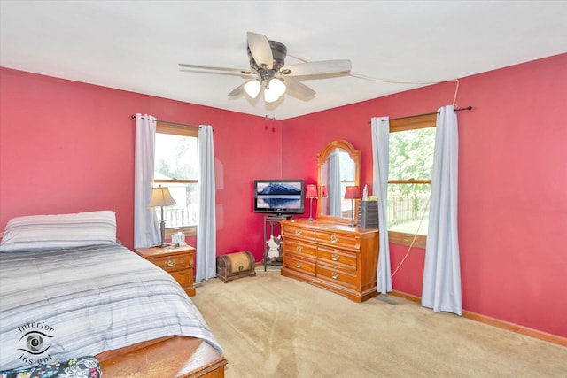 5S558 Tuthill Rd, Naperville, IL 60563 - bedroom with multiple windows, light carpet, and ceiling fan
