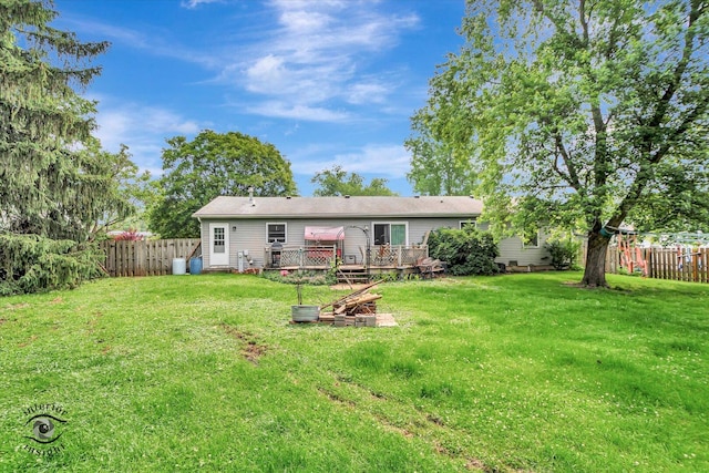 5S558 Tuthill Rd, Naperville, IL 60563 - rear view of house with a fenced backyard and a deck