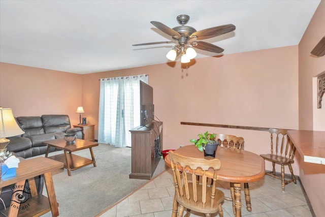 5S558 Tuthill Rd, Naperville, IL 60563 - dining area featuring a ceiling fan, light tile patterned floors, and light colored carpet