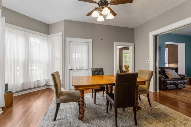 516 E Locust St, Watseka, IL 60970 - dining room featuring a ceiling fan and hardwood / wood-style floors