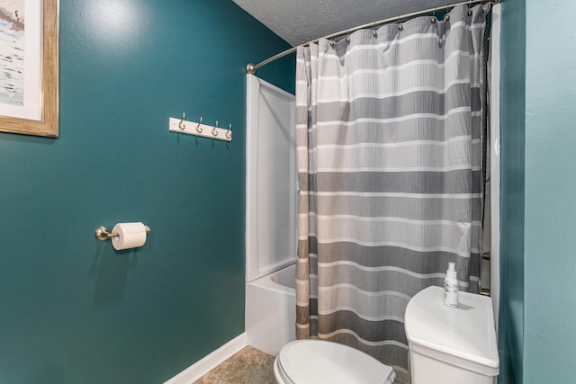 516 E Locust St, Watseka, IL 60970 - bathroom with shower / bath combo and a textured ceiling