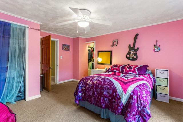 516 E Locust St, Watseka, IL 60970 - bedroom featuring carpet, ceiling fan, and a walk in closet