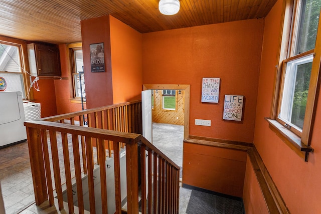 516 E Locust St, Watseka, IL 60970 - hall with plenty of natural light, an upstairs landing, and wood ceiling