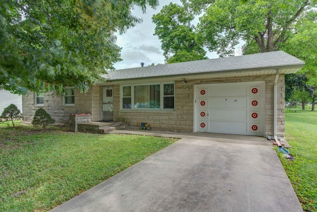 220 N Indiana St, Atwood, IL 61913 - view of front facade featuring a front yard, stone siding, an attached garage, concrete driveway, and a shingled roof