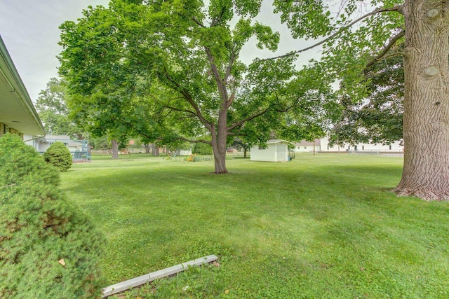 220 N Indiana St, Atwood, IL 61913 - view of green lawn featuring an outdoor structure