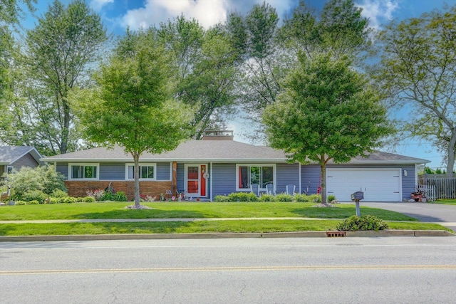 226 S Rathje Rd, Peotone, IL 60468 - ranch-style home featuring driveway, an attached garage, and brick siding