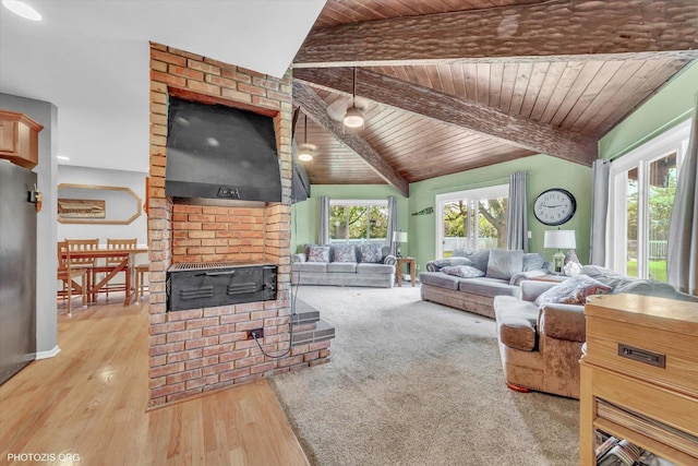 226 S Rathje Rd, Peotone, IL 60468 - living area with wooden ceiling, wood finished floors, and a brick fireplace