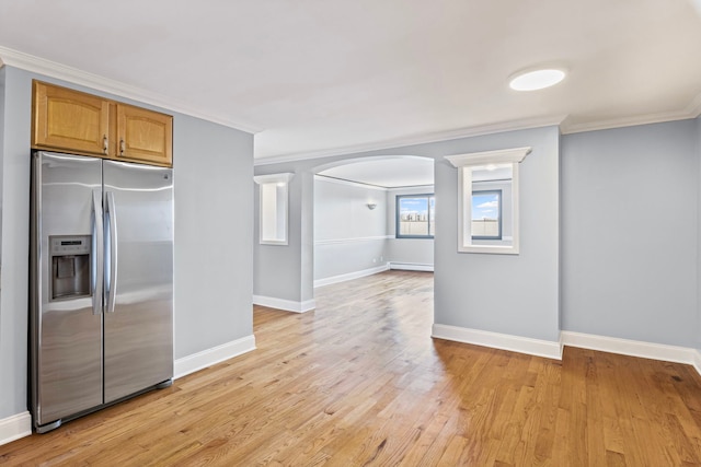9633 Brandy Ct Unit 6, Des Plaines, IL 60016 - kitchen with stainless steel fridge with ice dispenser, a baseboard heating unit, arched walkways, crown molding, and light wood-style flooring