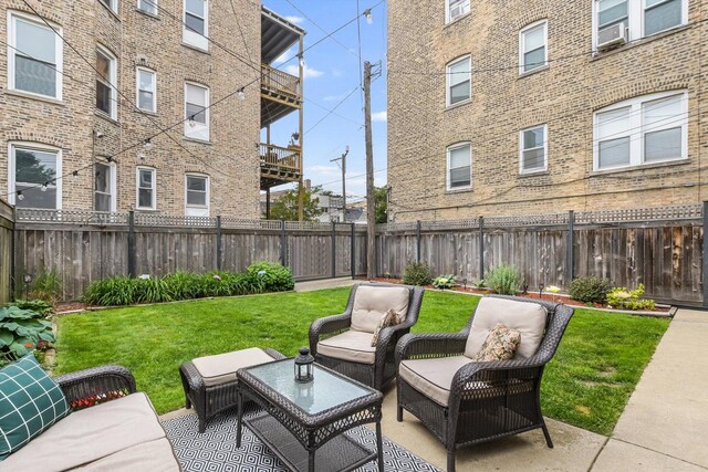4706 N Paulina St, Chicago, IL 60640 - fenced backyard with an outdoor hangout area and a patio