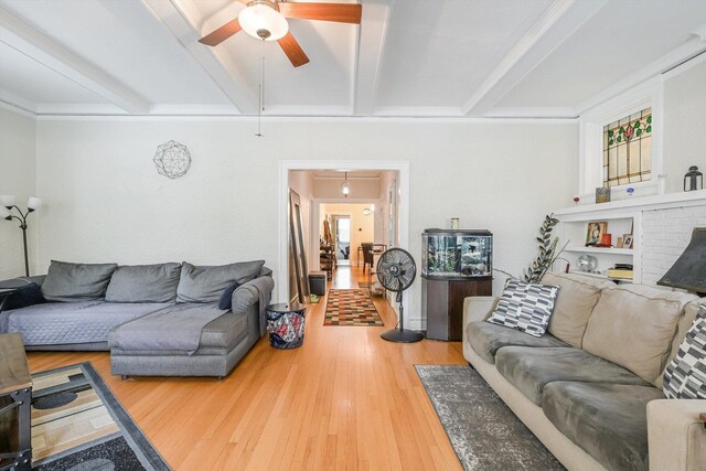 4706 N Paulina St, Chicago, IL 60640 - living room featuring ceiling fan, wood finished floors, and beam ceiling