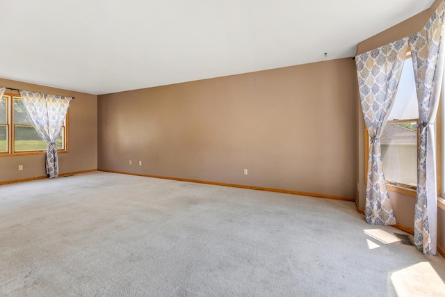 212 Jake Ln, Hampshire, IL 60140 - empty room with carpet floors and baseboards