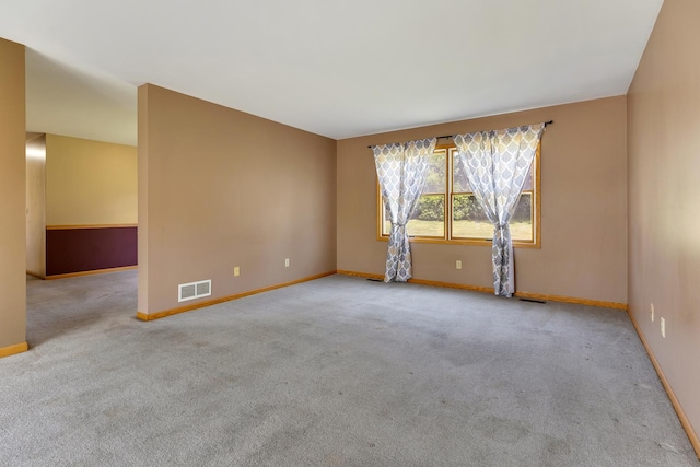 212 Jake Ln, Hampshire, IL 60140 - carpeted spare room with baseboards