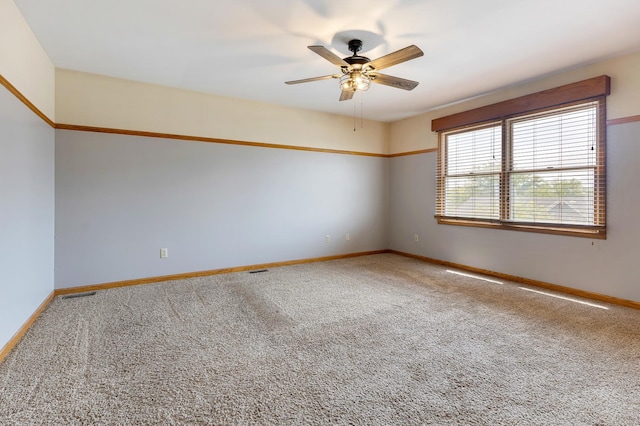 212 Jake Ln, Hampshire, IL 60140 - carpeted empty room featuring ceiling fan and baseboards